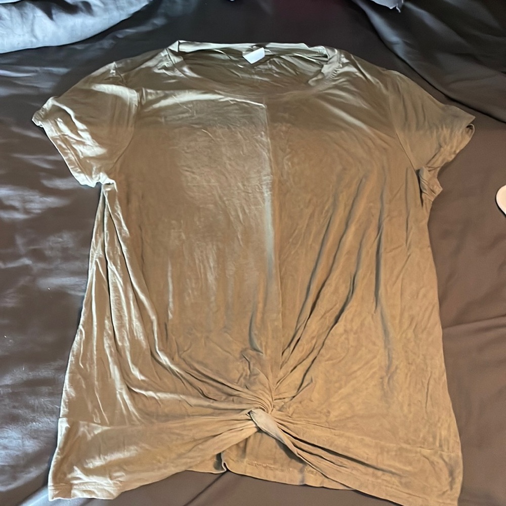 Green ish blue ish shirt